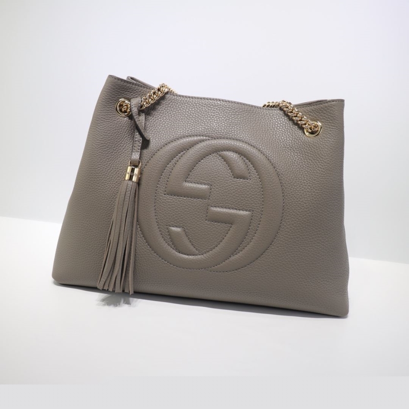 G*u*i top handle bags